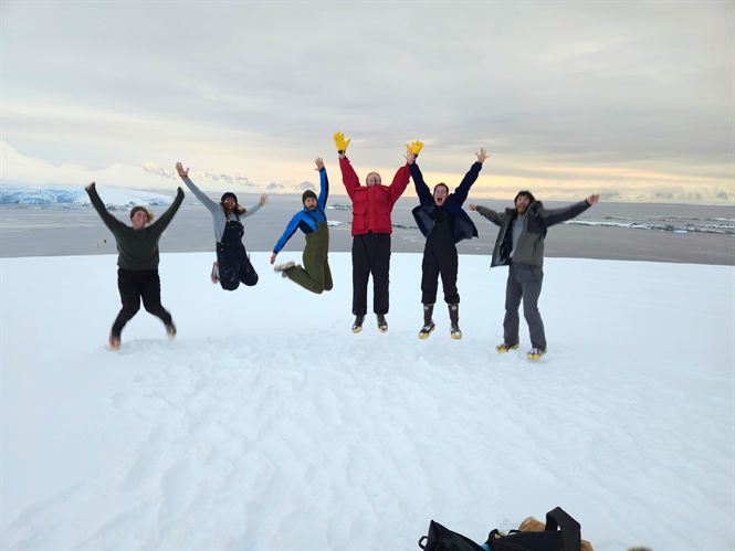 Jumping group photo hike